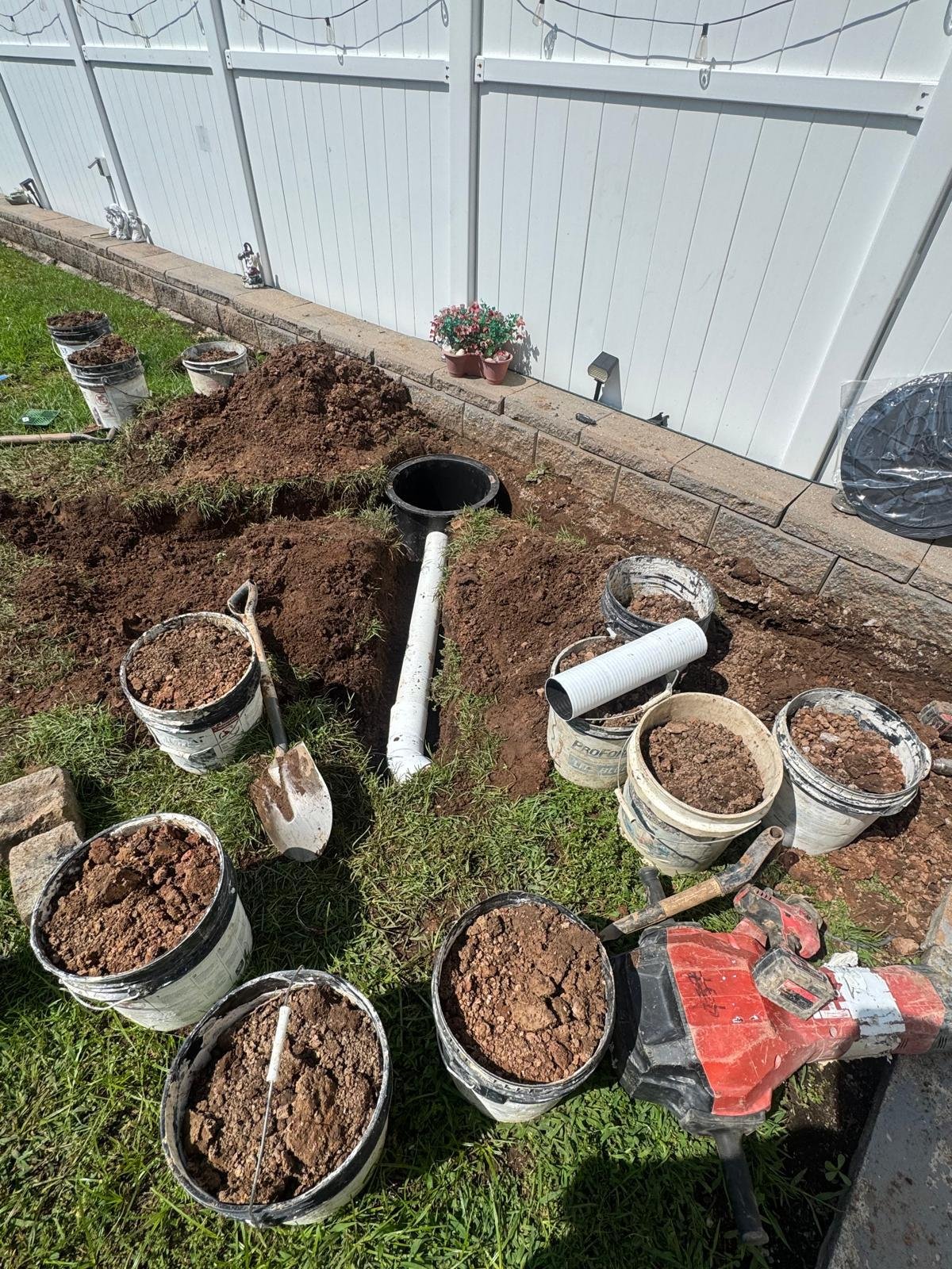 Downspout drainage work by Green Force Property Services